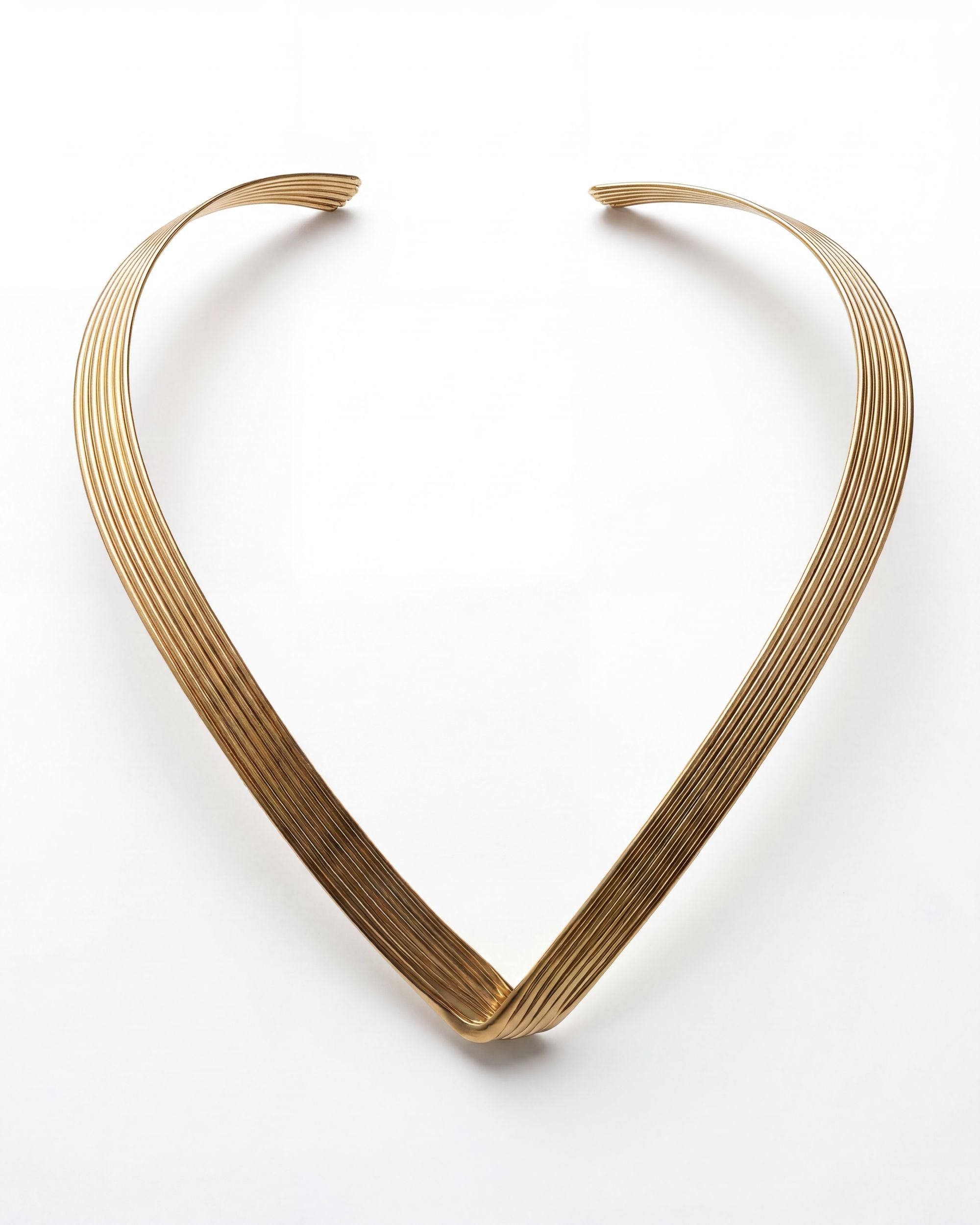 Gold necklace on a white background
